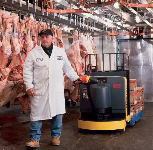 A Hyster walkie pallet truck in a cold room.