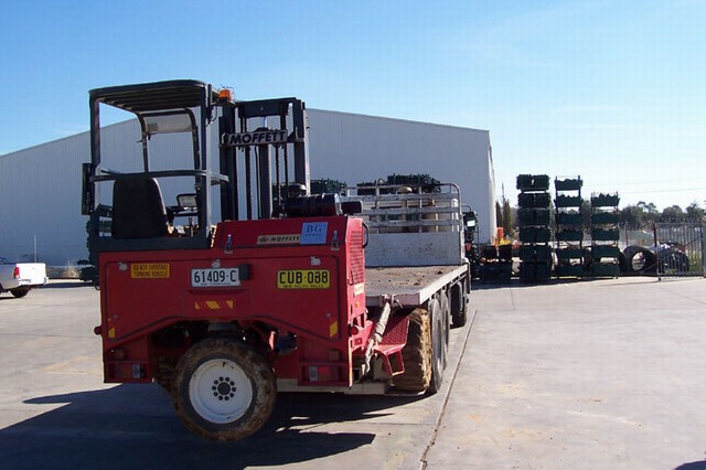 A Moffett truck-mounted forklift