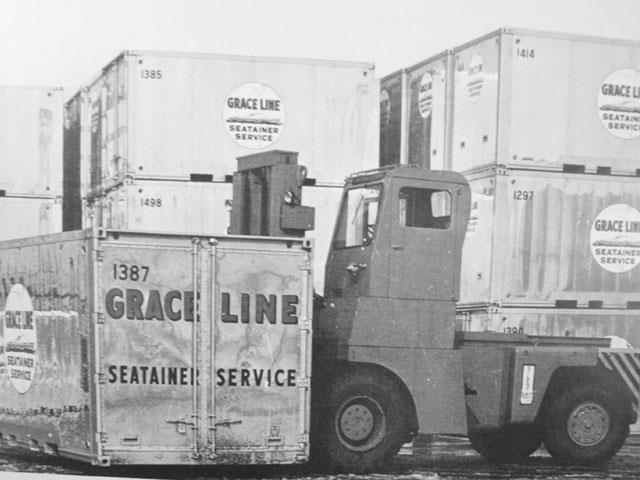Old Silent Hoist forklift picking up container
