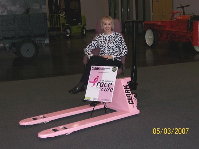 Karen Johnston with the pink pallet jack.