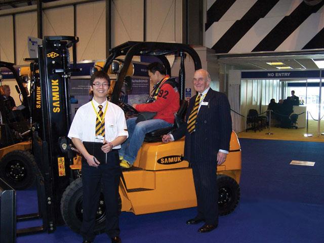Sir Neville Bowman-Shaw (far right) at Samuk's IMHX stand in Birmingham.