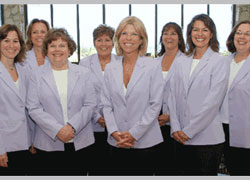 Liz Richards (centre) with her colleagues at MHEDA.