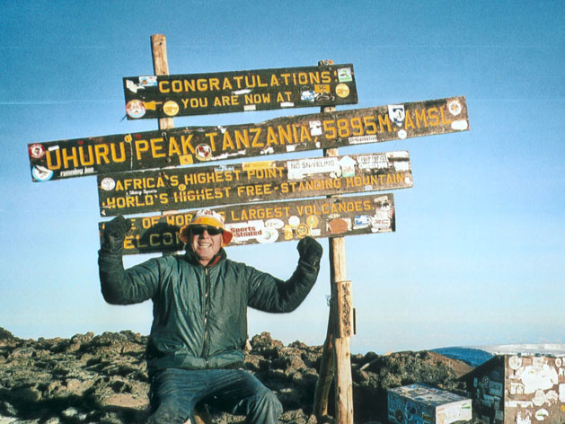 Chris Dolman at Mount Kilimanjaro's summit.