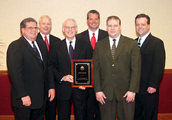 Crown staff with the International Society for Performance Improvement award.