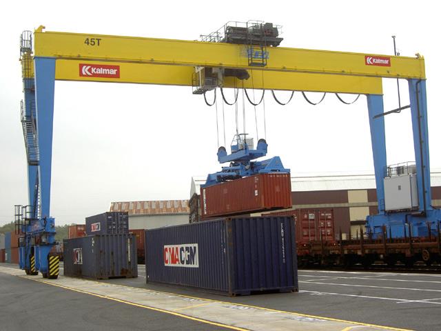 A Kalmar E-One RTG crane handling rail cargo at Terminal Container Athus, Belgium.