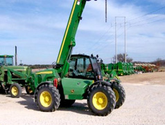 A John Deere 3420 telescopic forklift.