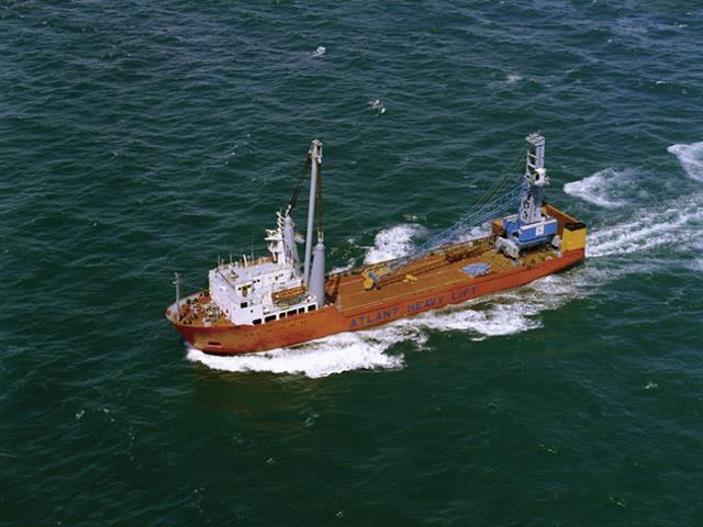 A completely assembled HMK 170 E Gottwald mobile harbour crane being shipped to its destination.