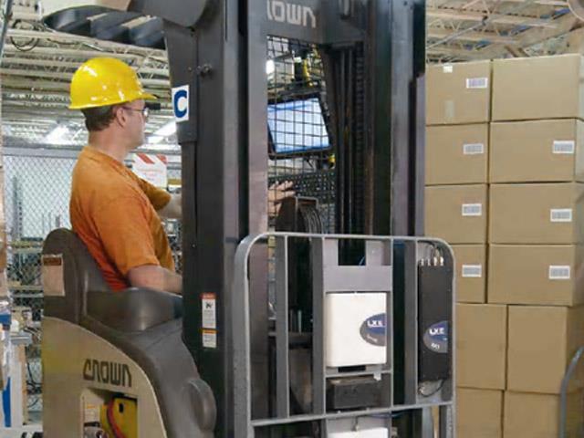 A forklift operator using the RX1.