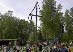 Dancing around the maypole, in Åmmeberg, Sweden
