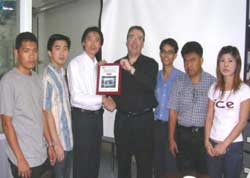 Mr Pin presents a 'thank you' gift to Al Sloan.