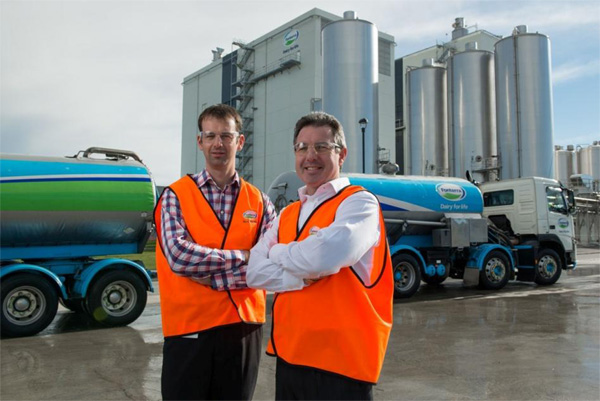 Canterbury operations manager Richard Gray, and director Logistics Network, Robert Spurway, stand in front of the world's largest milk powder drier at Fonterra's Darfield site.