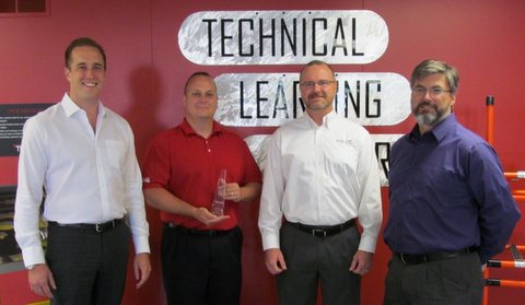 From left, Trilogiq USA director of operations Luman Temby, sales engineer Jason Bullard and national sales director Tim Floyd with John Hayes, Seegrid vice president of US sales and marketing