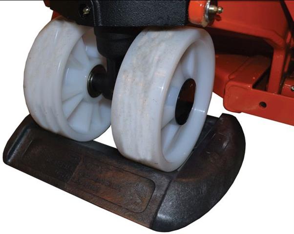 A hand pallet truck chock helps reduce the risk of damage.