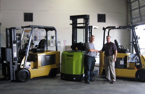 Coresential logistics manager Peter Gherini (left) and Ring Power area<br />salesman Joe Zevchak