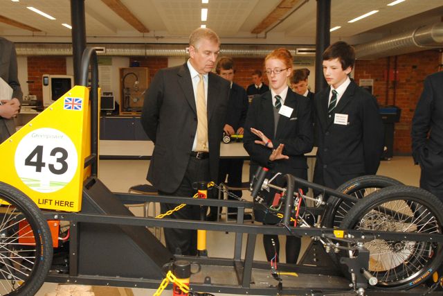 The Duke chats to Lucy McQuoney of Burton and Jared Wheatley of Stafford at the JCB Academy.