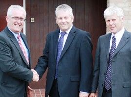 Kevin Tims, Clark UK sales manager, with Ambassador's Trevor De'Ath and Andrew De'Ath (Photo: Business Weekly)